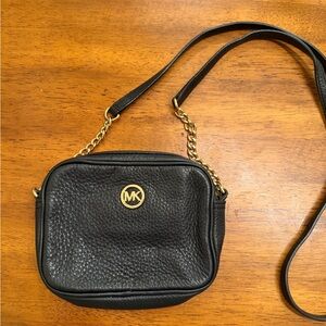 Michael Kors Fulton Small Leather Crossbody bag in black.